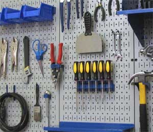 Grey Pegboard for Hanging Tools in the Garage